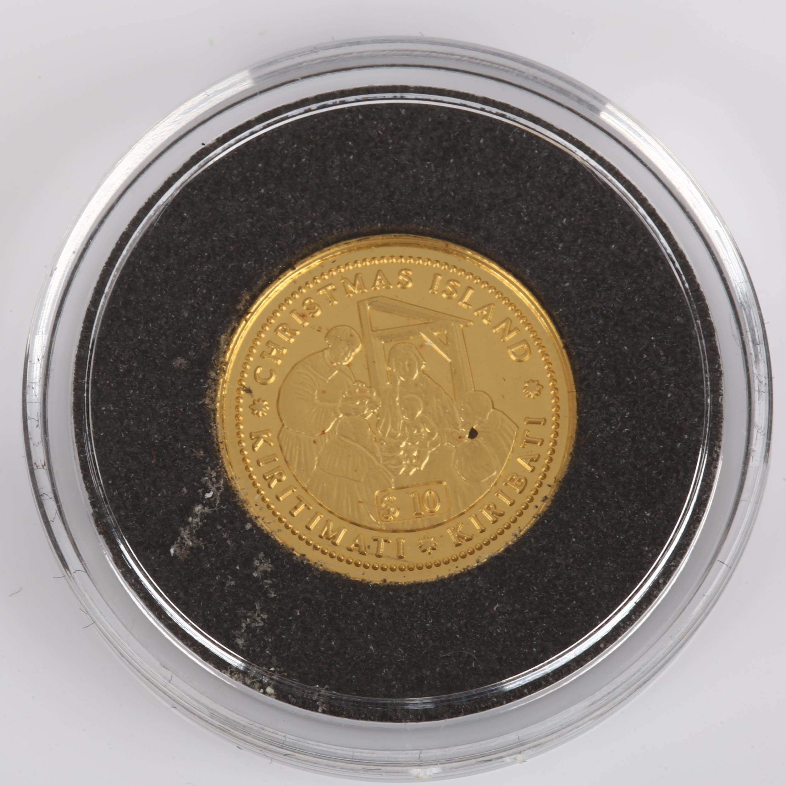 A 1998 Kiribati Christmas Island ten dollar 1/25 ounce gold coin, in presentation case with - Bild 3 aus 4