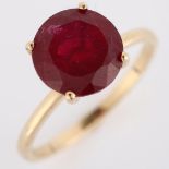 A modern 9ct gold synthetic ruby dress ring, set with modern round brilliant-cut ruby, diameter 15.