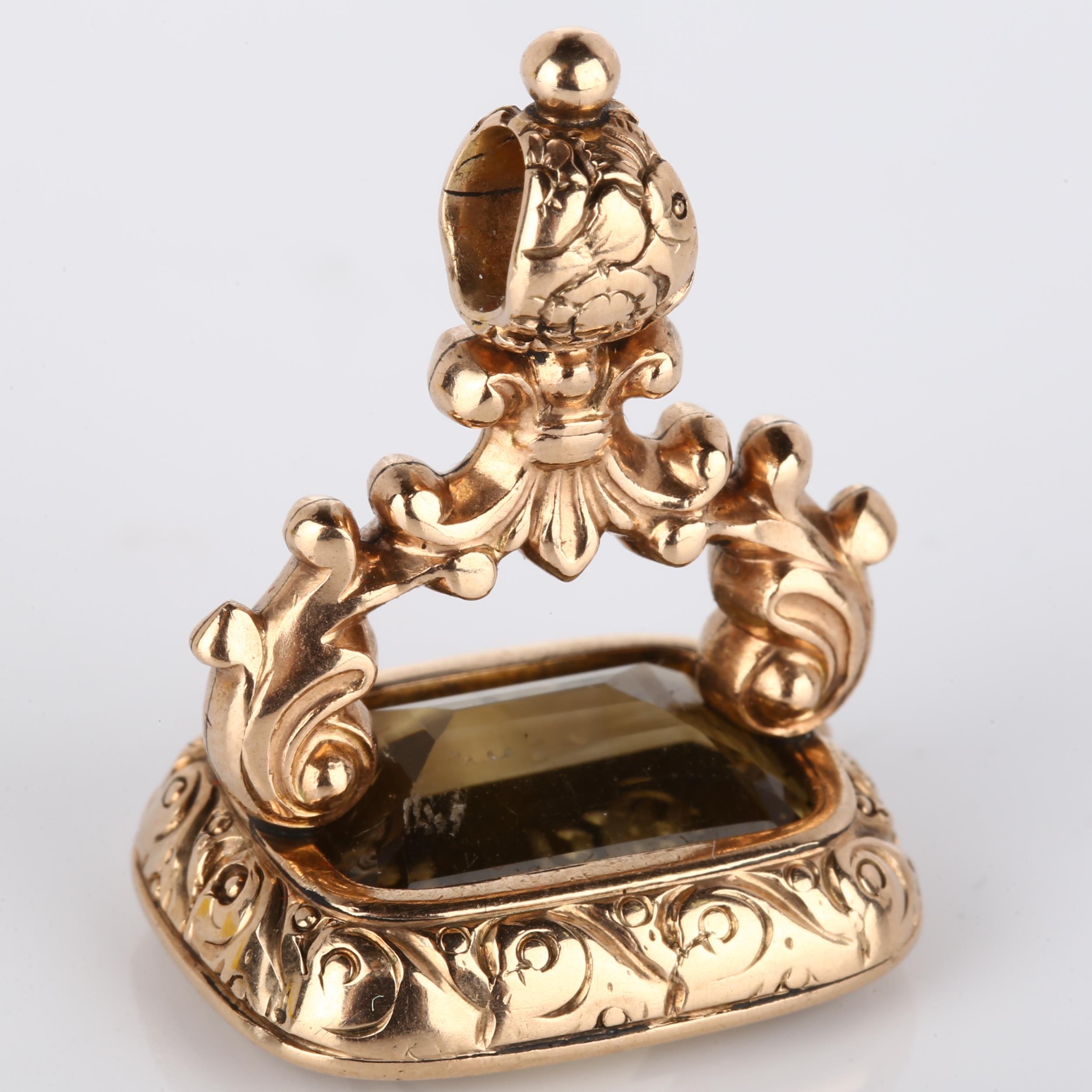 A Victorian smoky quartz seal fob, with intaglio carved rampant lion emblem and initials below, in - Image 2 of 4