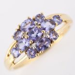 A modern 9ct gold tanzanite dress ring, set with oval mixed-cut tanzanite, setting height 9.4mm,