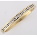 A modern 9ct gold diamond half eternity ring, channel set with modern round brilliant-cut