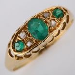 An early 20th century 18ct gold emerald and diamond half hoop ring, indistinct hallmarks, setting