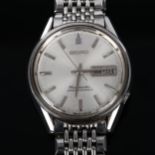 SEIKO - a stainless steel Seikomatic automatic bracelet watch, ref. 6216-9000, silvered dial with