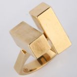 HANS HANSEN - a 1970s Danish 14ct gold geometric abstract ring, set with 2 offset cuboid blocks,