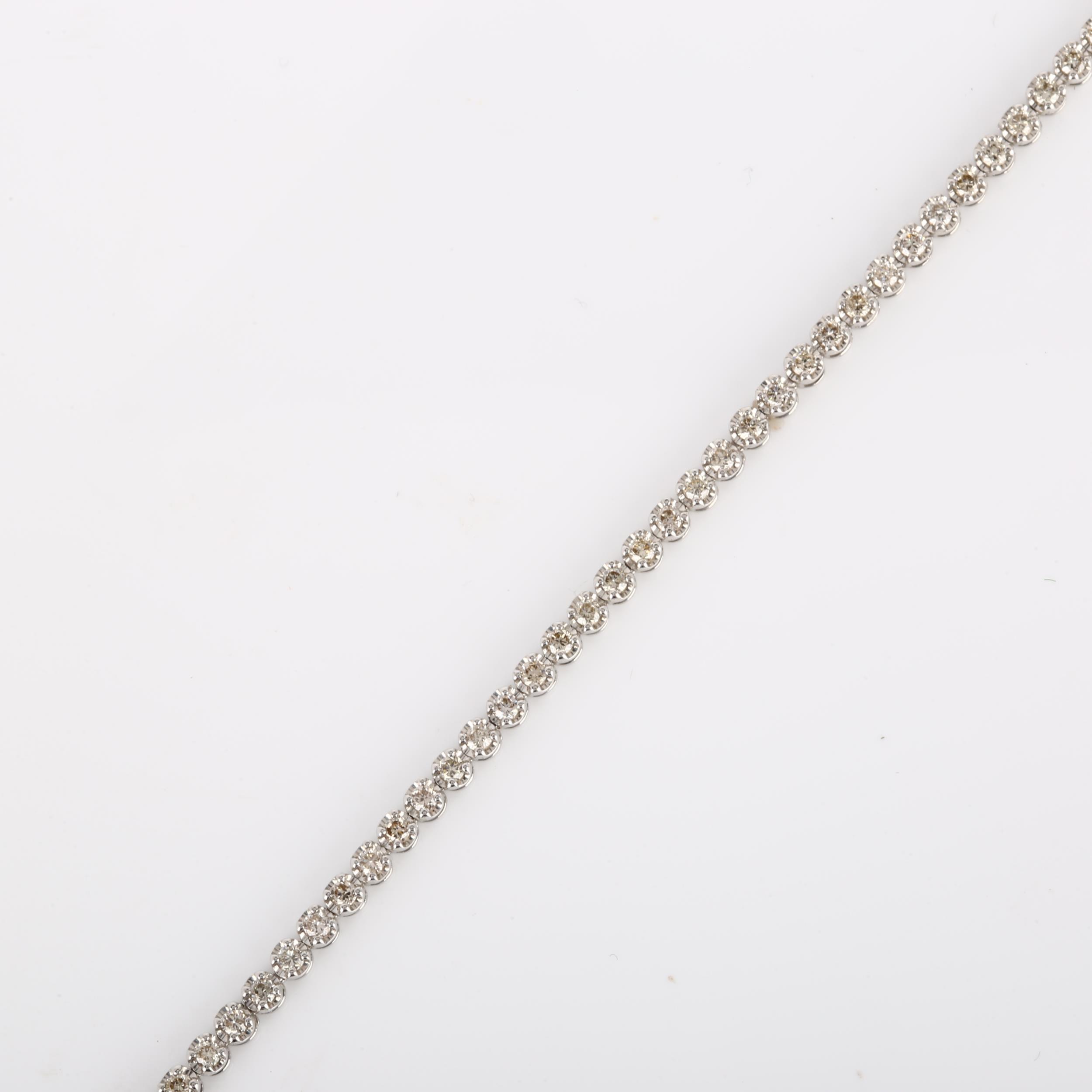 A modern 18ct white gold diamond tennis line bracelet, set with modern round brilliant-cut diamonds,