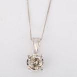 A 1.04ct solitaire diamond pendant necklace, 9ct white gold setting and 9ct fine curb link chain,