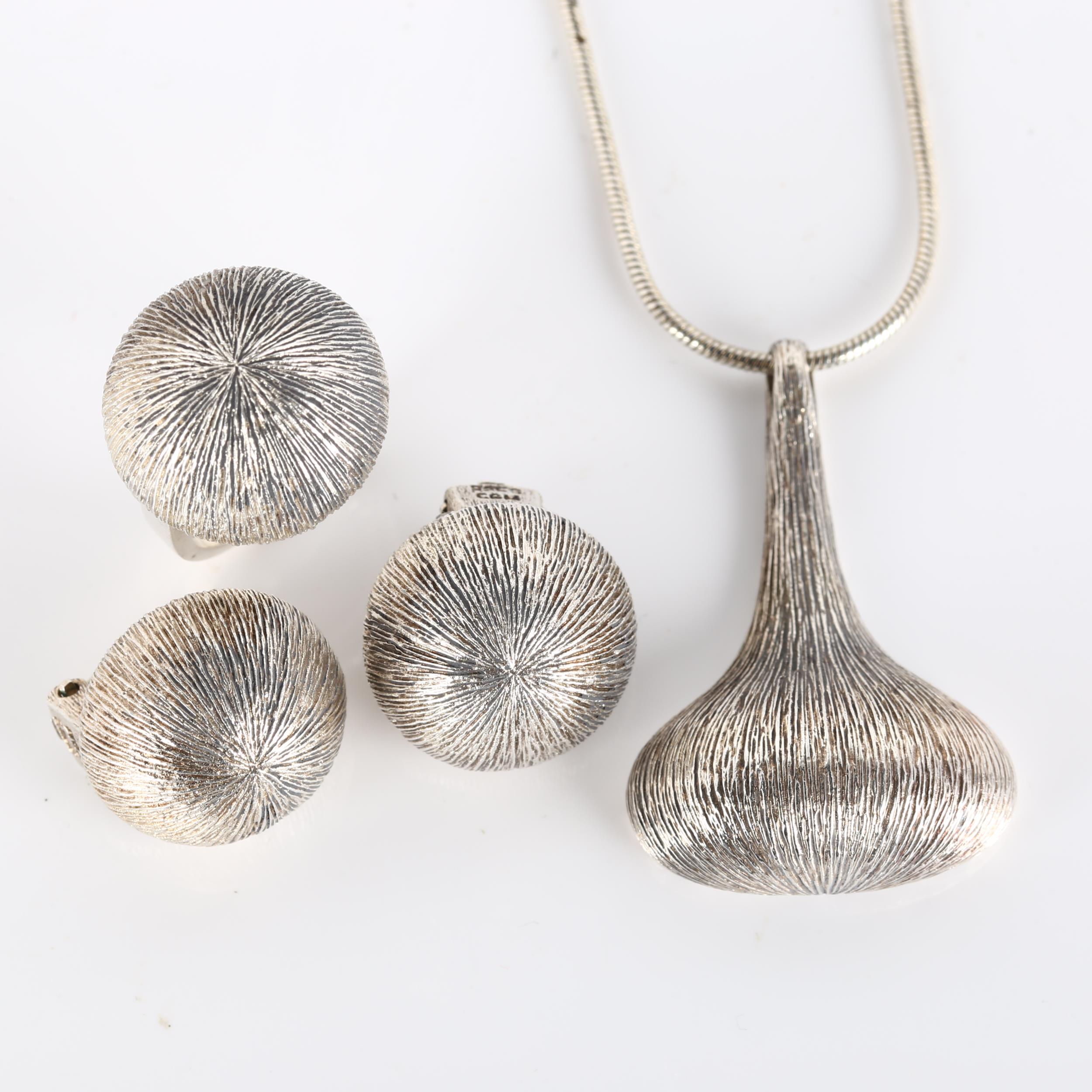 KLAUS GEORG MELCHER - a Danish modernist sterling silver demi-parure, comprising onion pendant