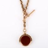 An Antique 9ct rose gold fancy link Albert chain necklace, with 9ct hardstone swivel fob, T-bar