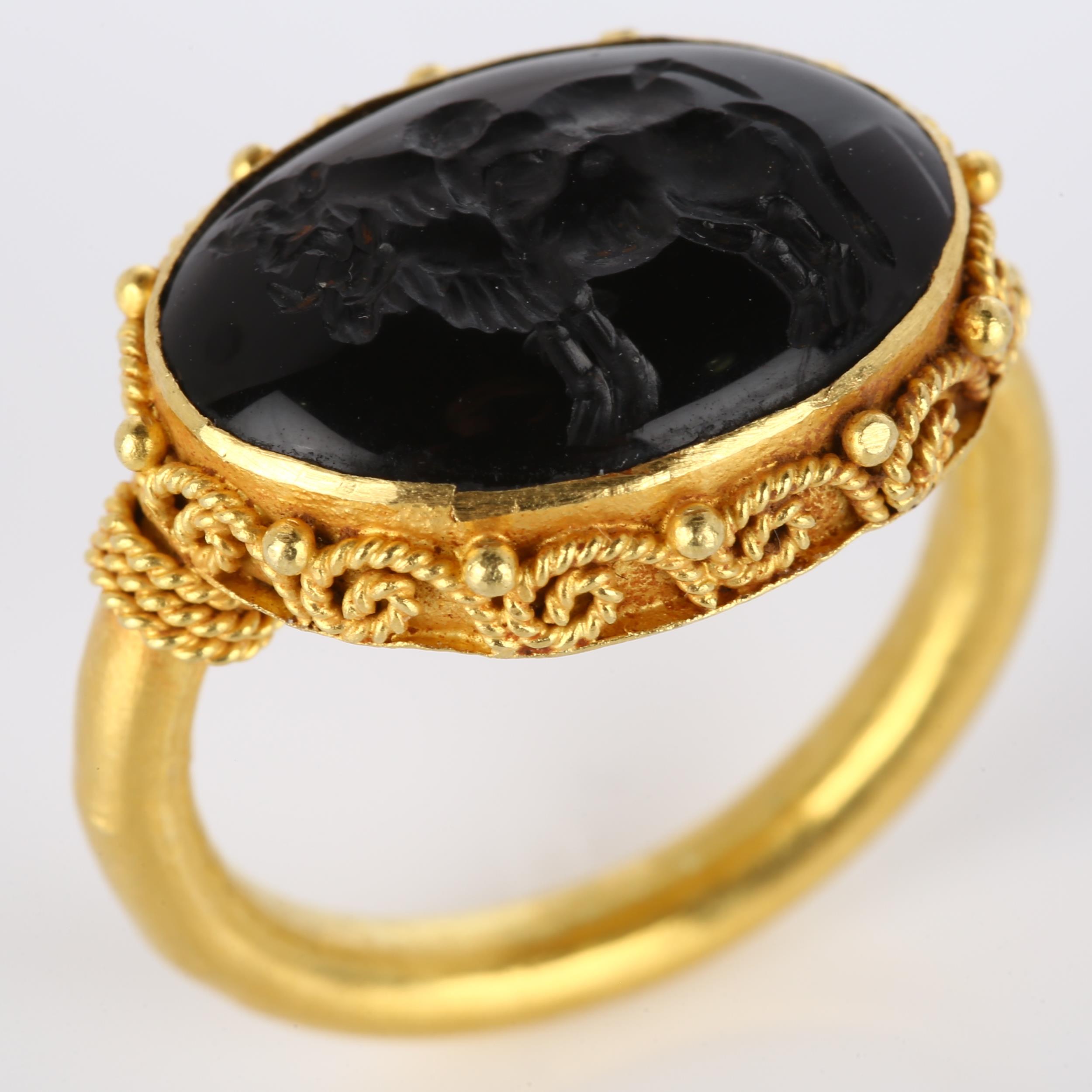 A Victorian style seal ring, unmarked high carat gold settings with wirework surround and intaglio - Image 2 of 4