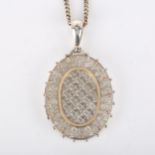A Victorian photo locket pendant necklace, unmarked silver settings with applied two-colour gold