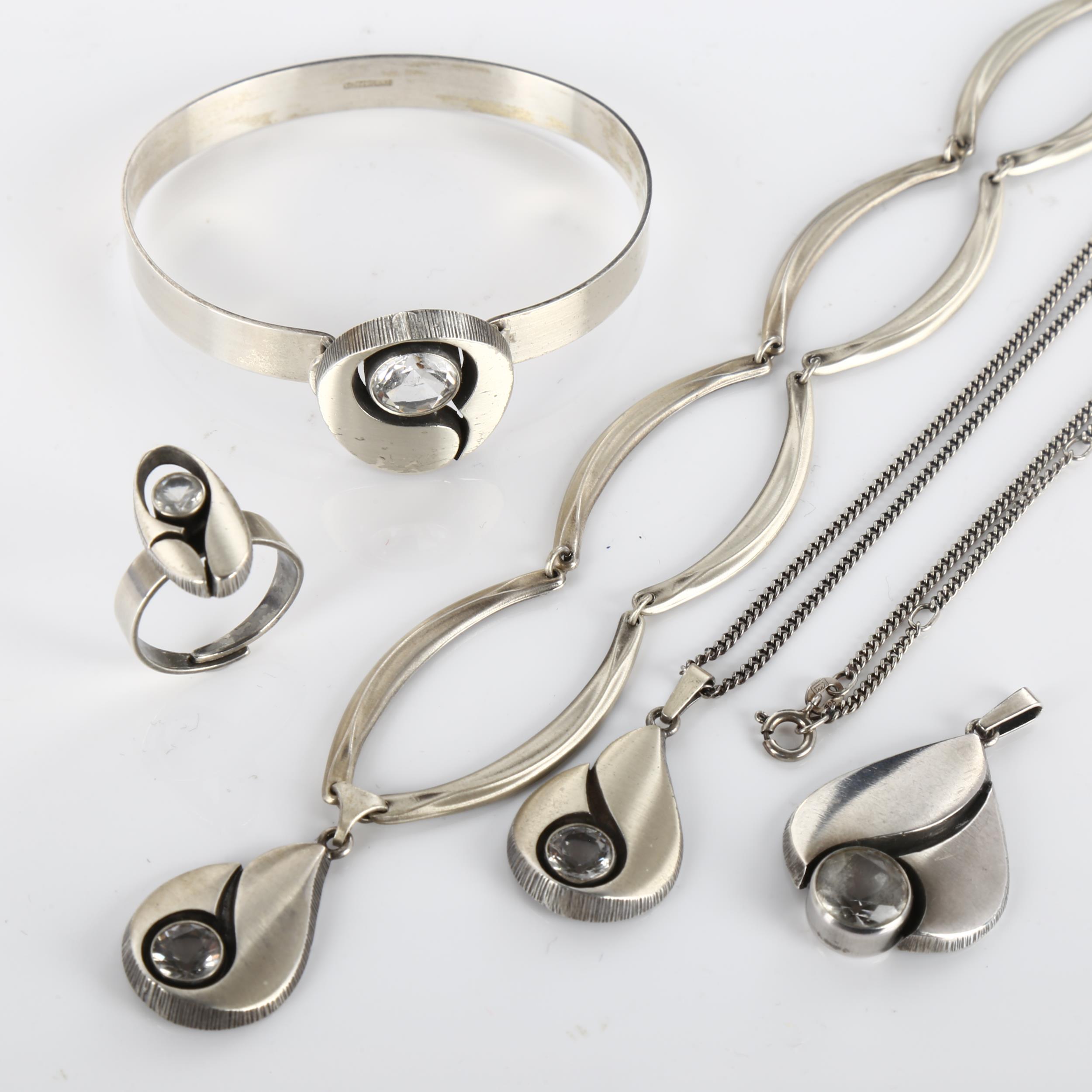 A group of Finnish sterling silver and cubic zirconia jewellery, comprising 3 pendant necklaces, 1