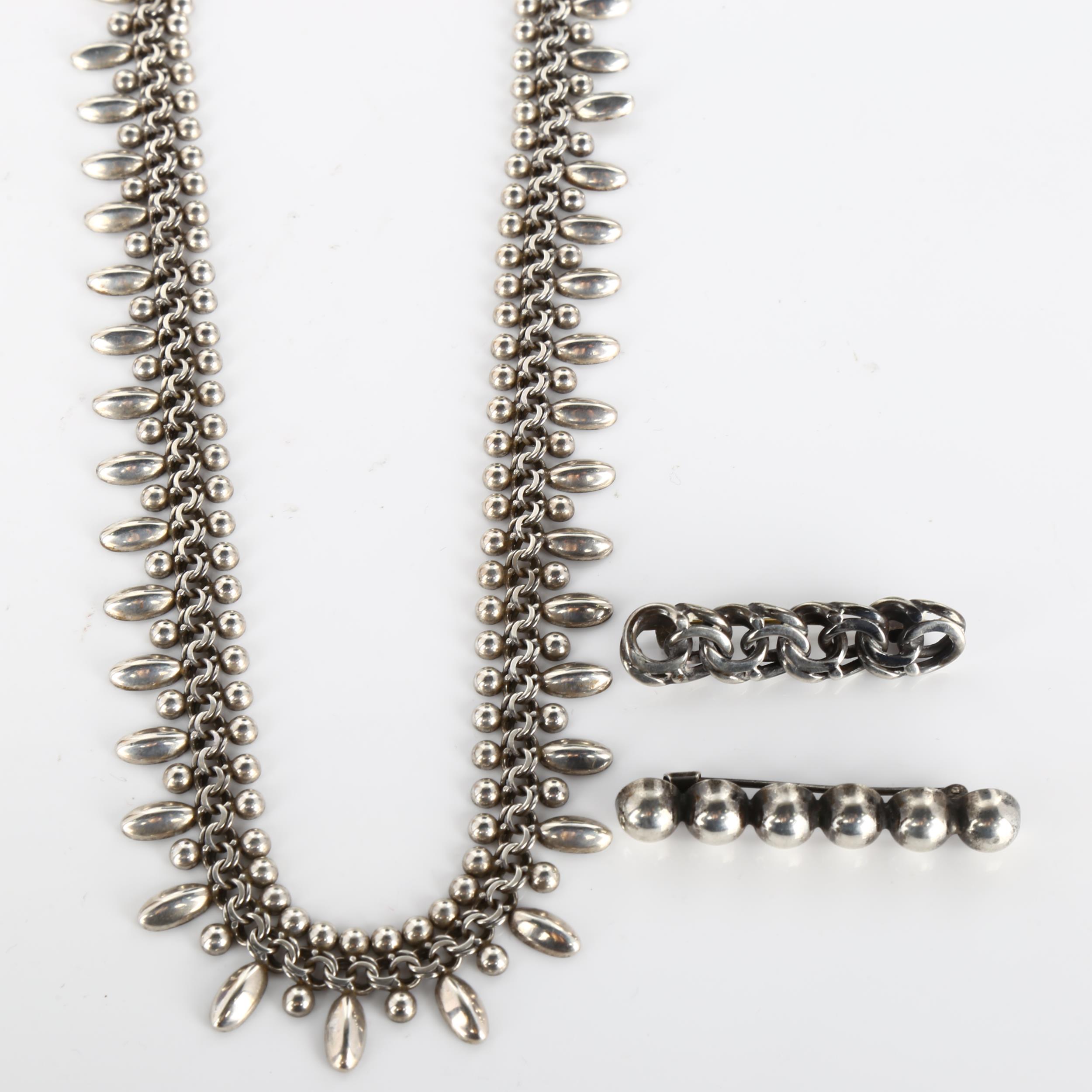 HERMANN SIERSBOL - a Danish stylised sterling silver fringe necklace, length 45cm, and 2 Danish