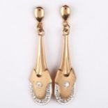 A pair of unmarked gold cubic zirconia pendant earrings, with stud fittings, earring height 42.