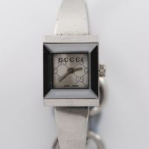 GUCCI - a lady's stainless steel quartz bracelet watch, ref. 128.5, square GG monogram dial with