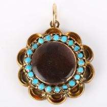 A Victorian turquoise memorial locket pendant, unmarked gold settings with vacant central panel