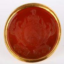 A large Victorian armorial seal fob, intaglio carved carnelian with Order Of The Bath motto "Tria