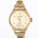 J W BENSON - a lady's 9ct gold mechanical bracelet watch, ref. 87757, silvered dial with gilt Arabic