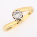 An 18ct gold 0.33ct solitaire diamond ring, with crossover shoulders, set with modern round