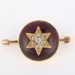 A large Victorian garnet and diamond starburst bar brooch, unmarked gold closed-back settings with