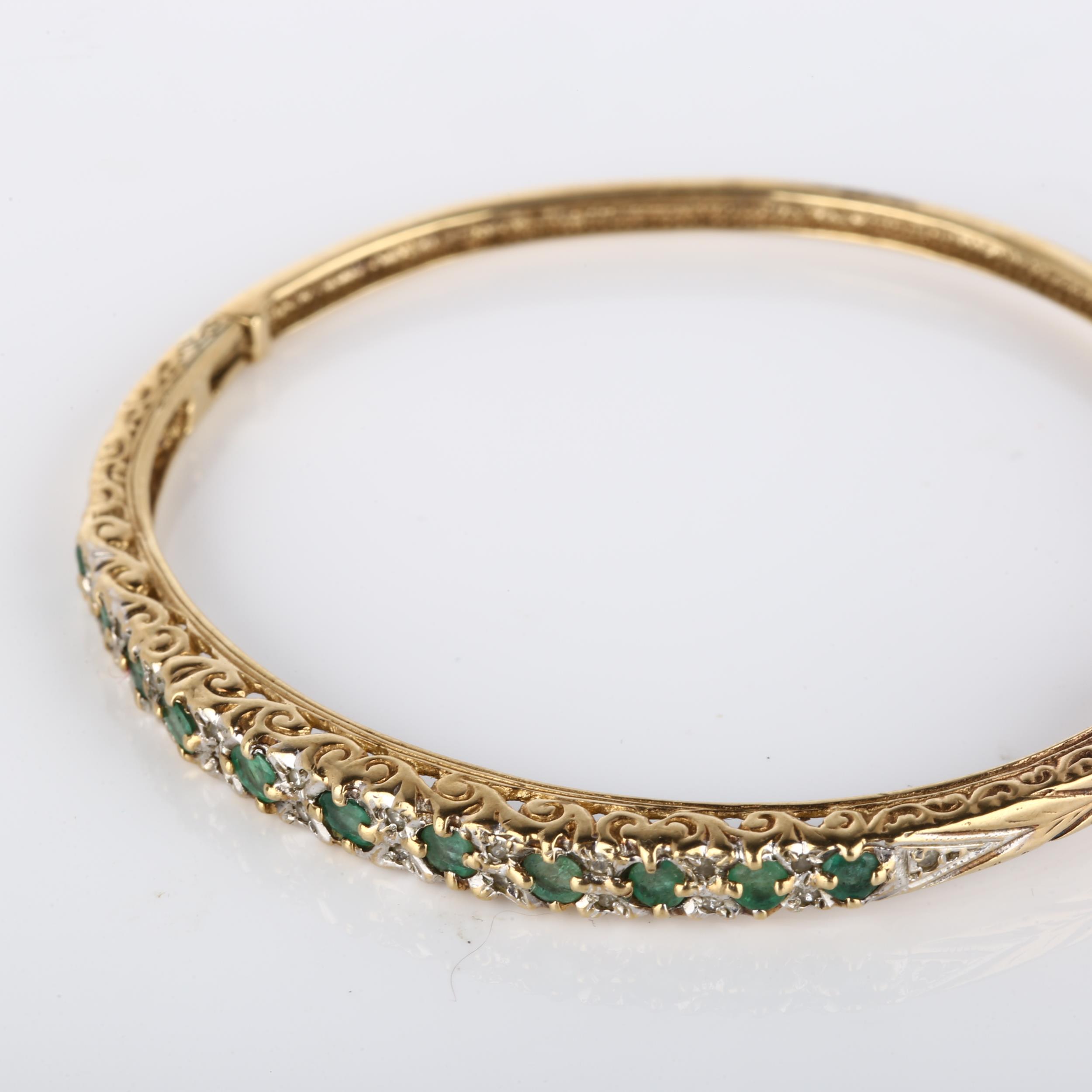 A 9ct gold emerald and diamond hinged bangle, set with round-cut emerald and single-cut diamonds, - Image 2 of 4