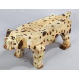 Gerard Rigot (born 19290, carved and painted wood sculpture of a dog, signed underneath, length 49cm