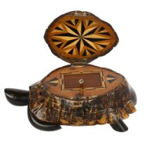A late 19th century Ceylonese hardwood and tortoise shell casket, with hinged lid enclosing exotic