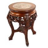 A Chinese rosewood circular occasional table, with inset marble top and carved frieze, diameter