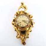 A cartel wall clock in elaborate Rococo style, carved giltwood frame, dial signed Westerstrand,