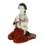 Japanese porcelain figure of a kneeling girl, height 25cm 2 small chips on the edge of the base