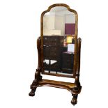 A 19th century mahogany cheval mirror, with carved and scrolled supports, overall height 160cm