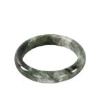 A Chinese green jade bangle, internal diameter 6.5cm, cased