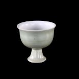 A Chinese celadon glaze stemmed cup, Qing Dynasty, height 7cm 1 repaired rim chip