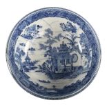 An 18th century blue and white transfer decorated bowl, diameter 27cm, restored Bowl has been broken