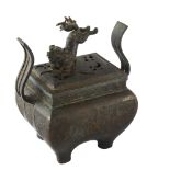 A Chinese patinated bronze incense burner, with dog of fo finial and 6 character mark, height 17cm