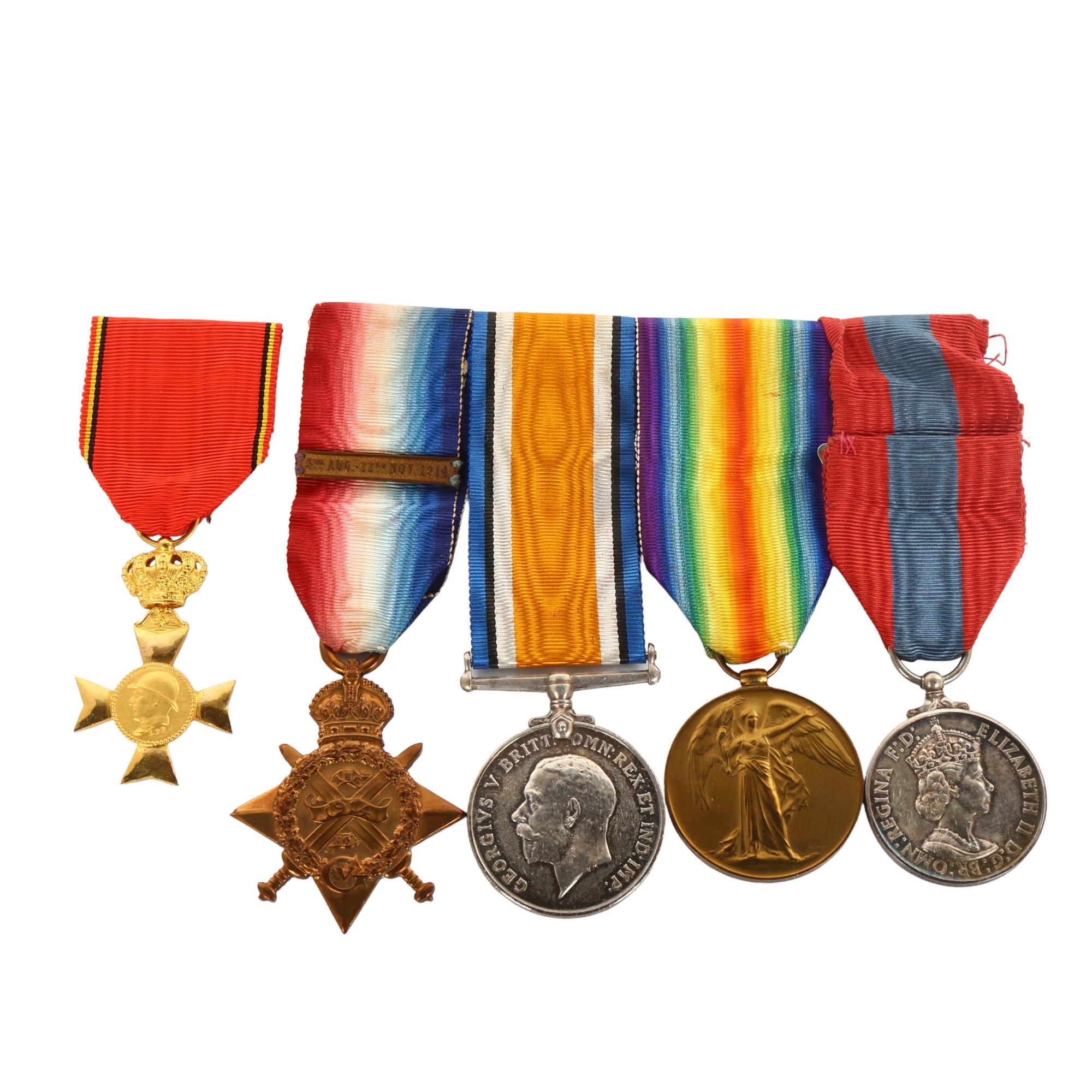 A group of 4 Great War and Faithful Service medals, awarded to Bmbr C E Brown RFA65664, comprising