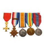 A group of 4 Great War and Faithful Service medals, awarded to Bmbr C E Brown RFA65664, comprising