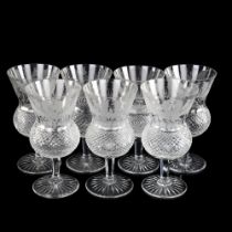 EDINBURGH CRYSTAL - a set of 7 thistle-shaped wine glasses with etched thistle decoration, height