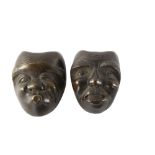 A pair of miniature Chinese cast-bronze masks, height 4cm Good condition