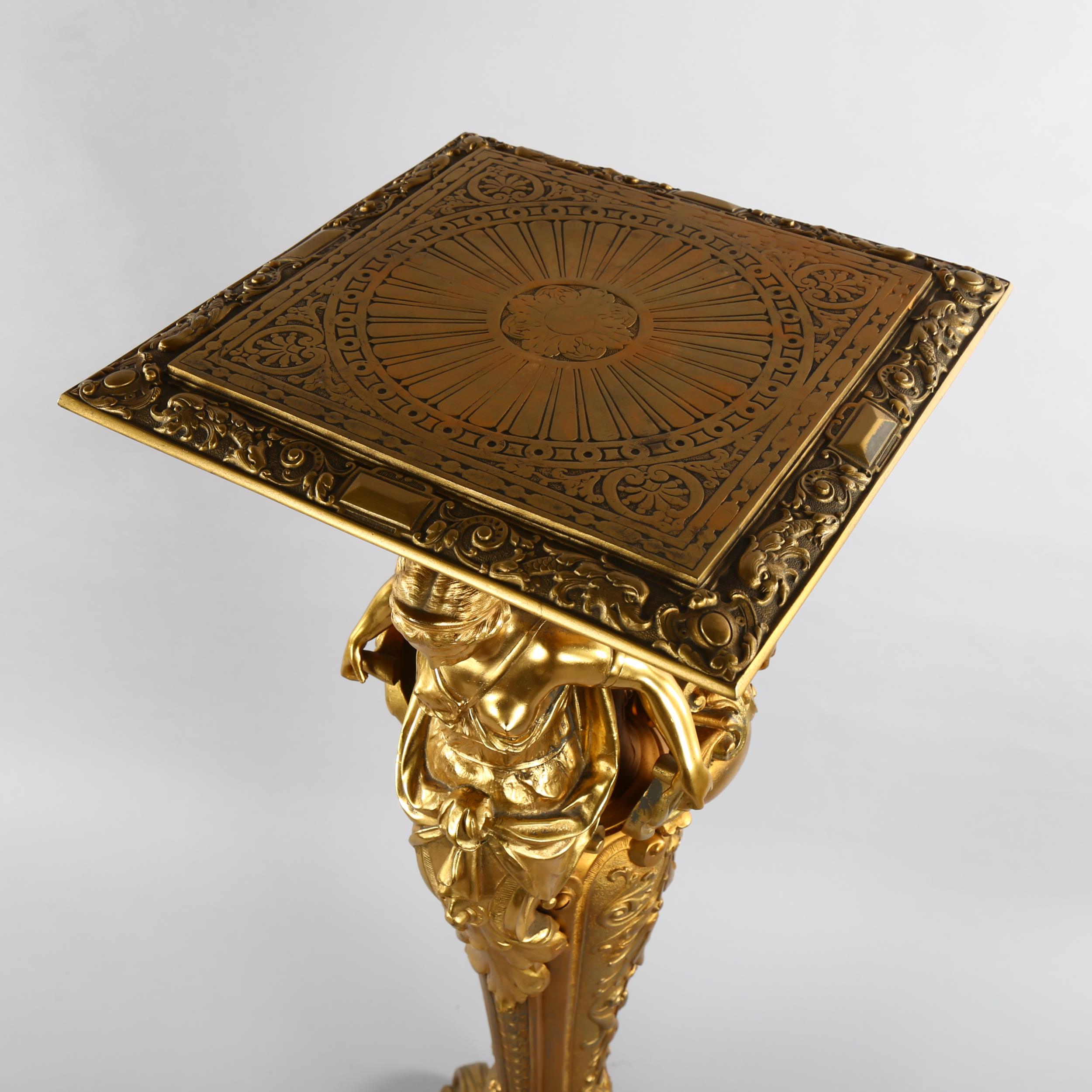 Empire style gilt-bronze jardiniere stand, the relief moulded square top supported by Classical - Bild 2 aus 3
