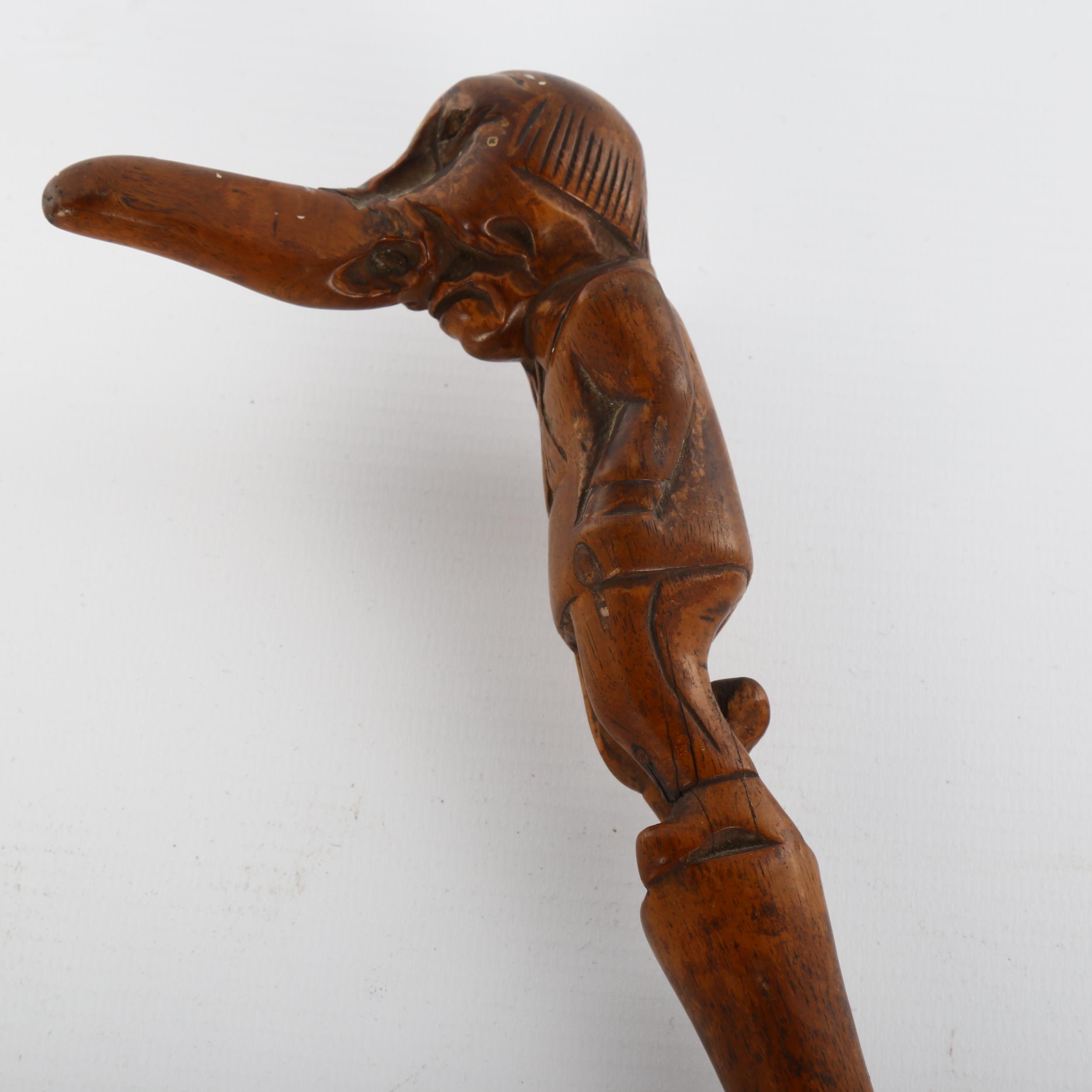 A 19th century novelty walking stick, the handle carved in the form of a one-legged man with a big - Bild 2 aus 3