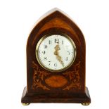 An Edwardian rosewood and marquetry inlaid lancet-top mantel clock, with 8-day sprung movement,