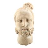 A Mesopotamian terracotta head of a man, height 18.5cm