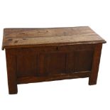 A small 18th century oak blanket chest with panelled front, length 98cm