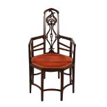 An unusual Arts and Crafts/Art Nouveau 8-legged mahogany-framed armchair in the manner of