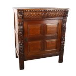 A 19th century carved oak side cabinet with drawer over cupboard, Height 107cm x Width 92cm x