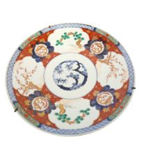 A large Japanese 19th century porcelain charger with painted and gilded decoration, 4 character