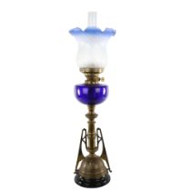 Victorian brass and blue glass duplex oil lamp, in the manner of Christopher Dresser, with