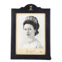 HRH PRINCESS MARGARET, COUNTESS OF SNOWDON - photographic portrait, signed in ink below the photo