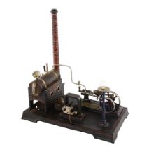 A live steam-powered model stationary engine by Doll & Co Germany, early 20th century, on tinplate