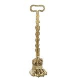 A Regency gilt-brass hairy paw design doorstop with lead-weighted base, height 41cm Good original